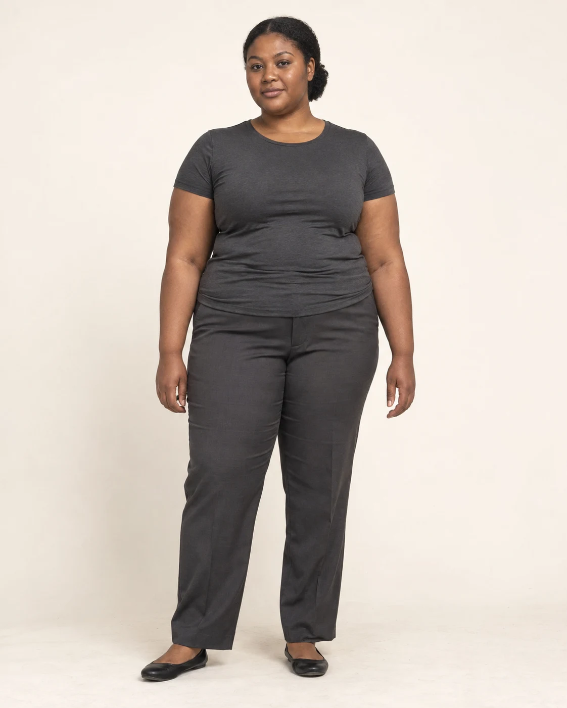 Original full-length synthetic plus-size fashion casting master in a neutral studio