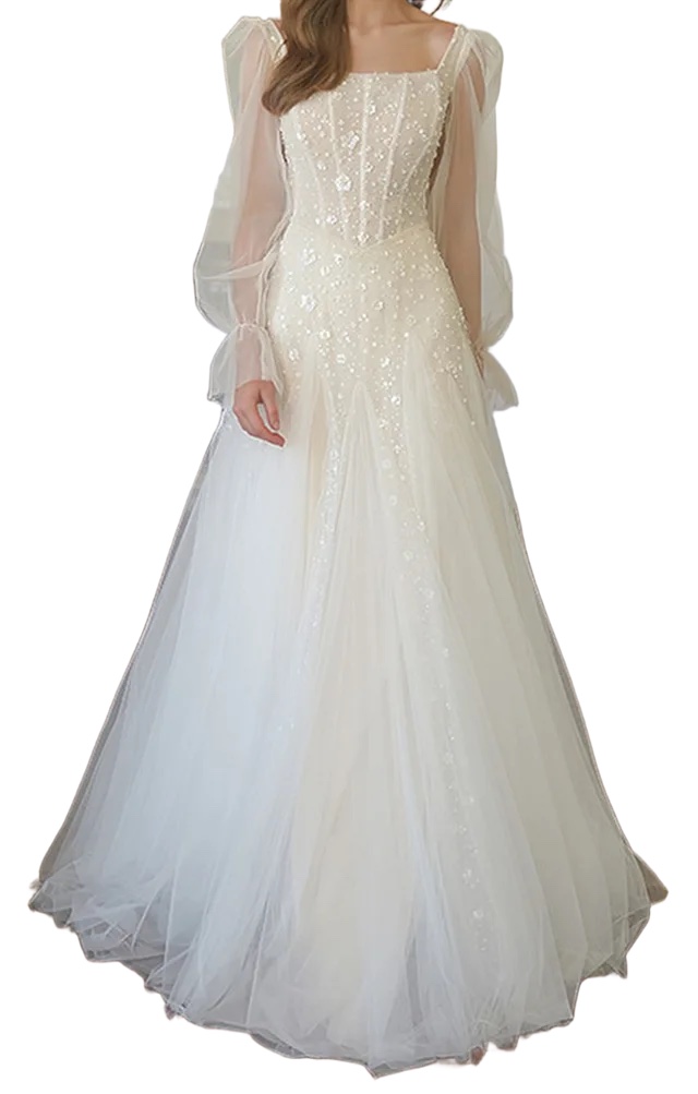 Off-white beaded tulle wedding dress reference on a model